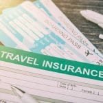 Travel Insurance form at the top of Boarding pass.